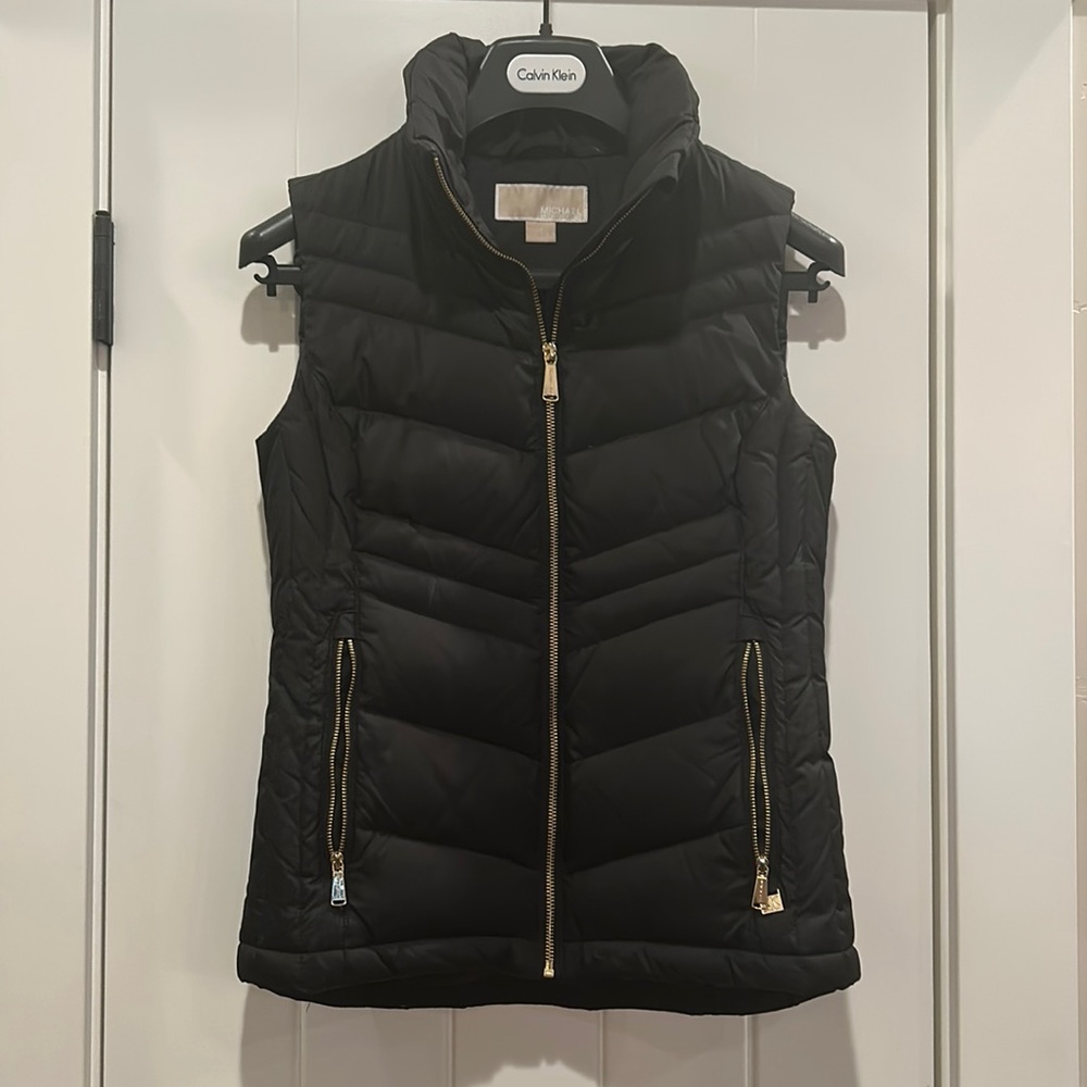 Like new black Michael Kors women’s XS down puffy vest with gold detail